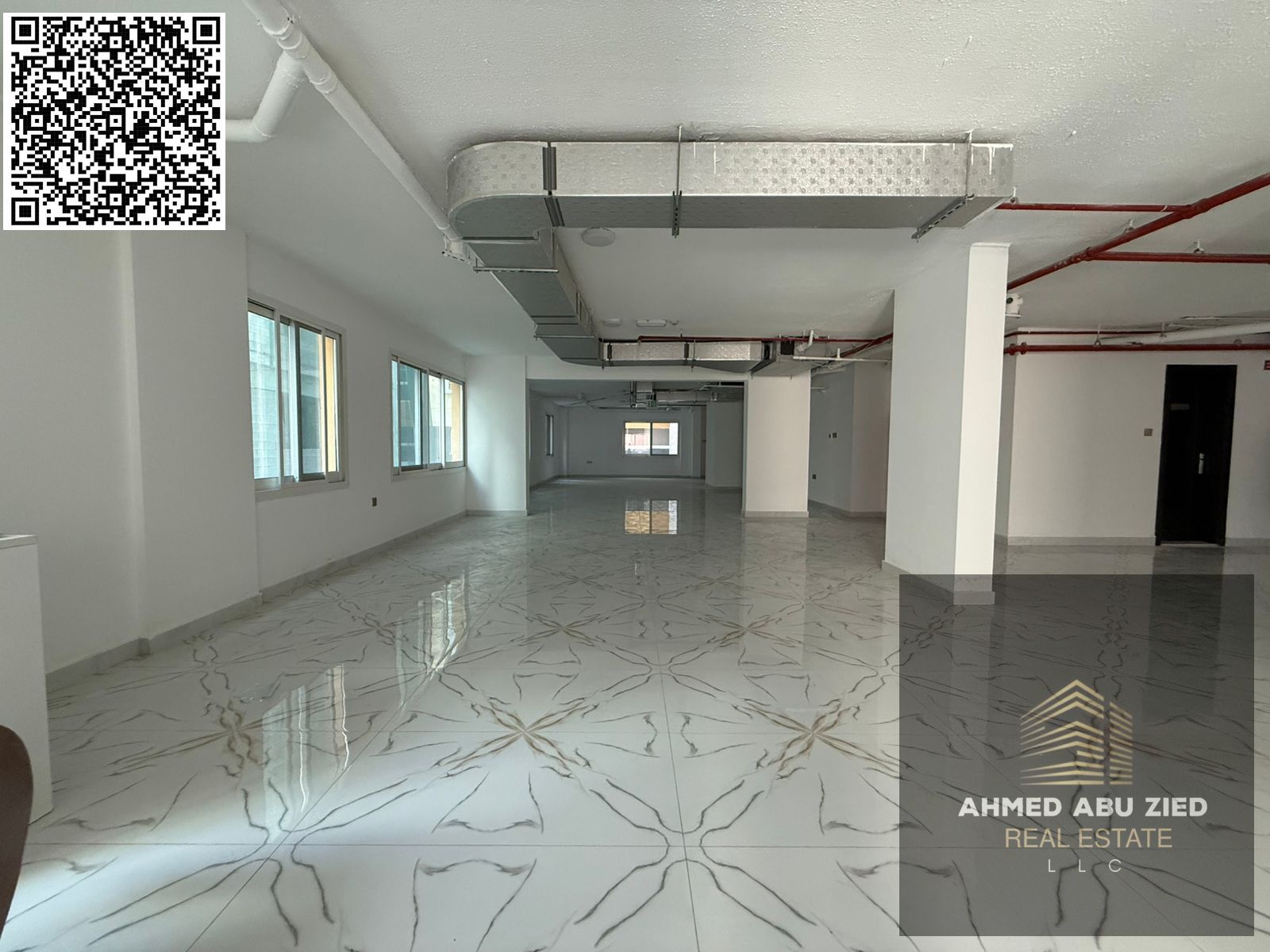 For annual rent: A very spacious office or company headquarters, up to 2,500 square feet, occupying an entire floor in a prime location in Al Muwaihat
