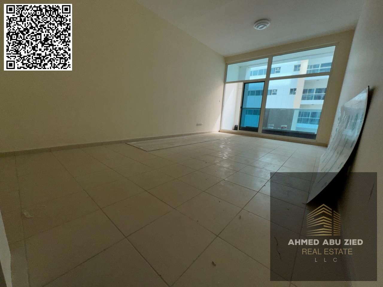 For annual rent in Ajman, a two-bedroom apartment with a living room, three bathrooms, and a storage room is available in Al Rashidiya 3 Towers, Ajman
