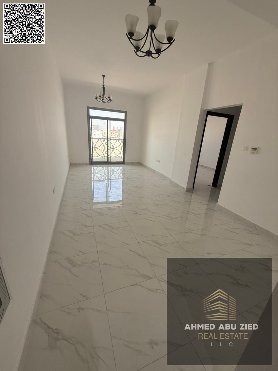 For annual rent in Ajman, a brand new building offers a two-bedroom apartment with a living room, three bathrooms, a balcony with an open view