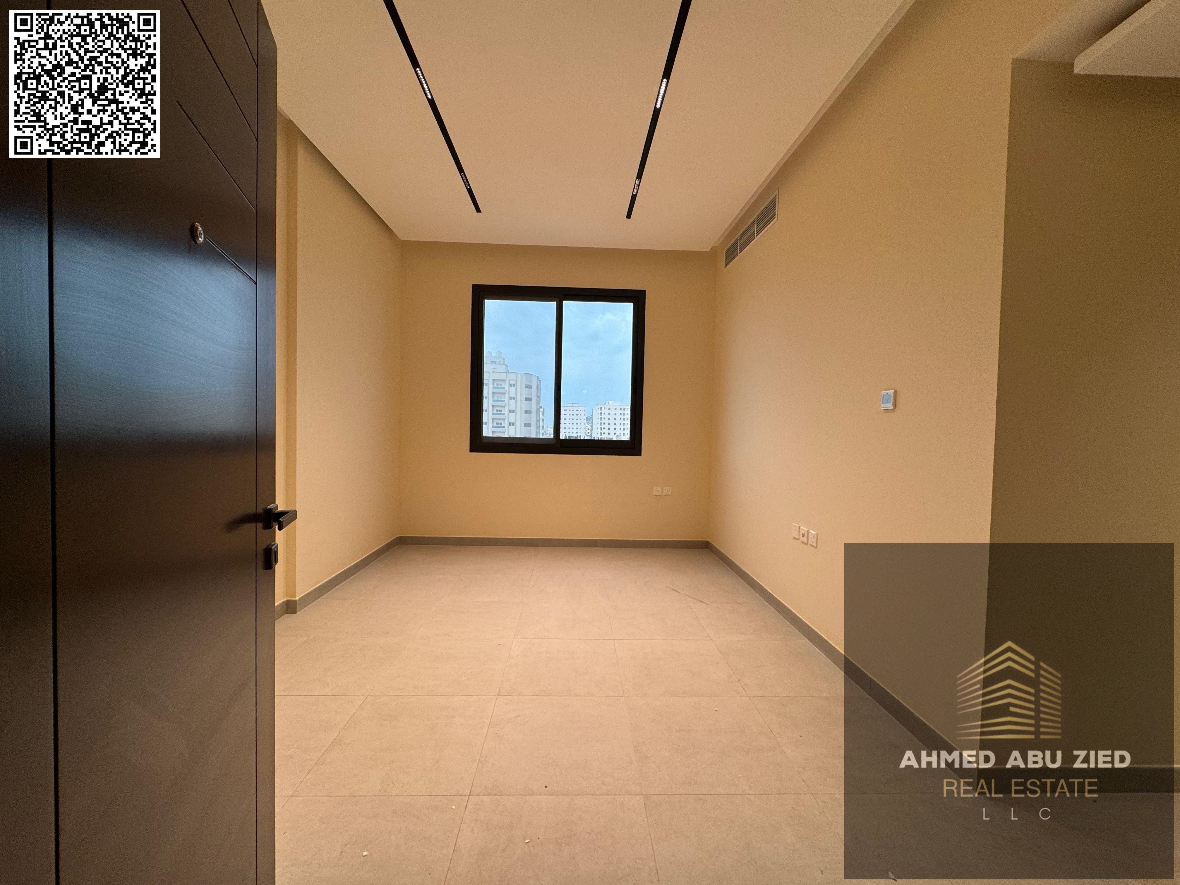 2BR Hall for Annual Rent in Al Jurf 3 | Brand‑New | Super Deluxe Finishing | 2 Baths | Balcony | Central AC | 1 Month Free | Flexable Payments