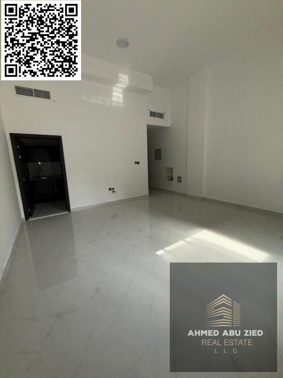 Luxury studio apartment for annual rent in Al Karama, Ajman. First occupancy, close to Ajman Corniche. Spacious, bathroom, separate kitchen. AED 25