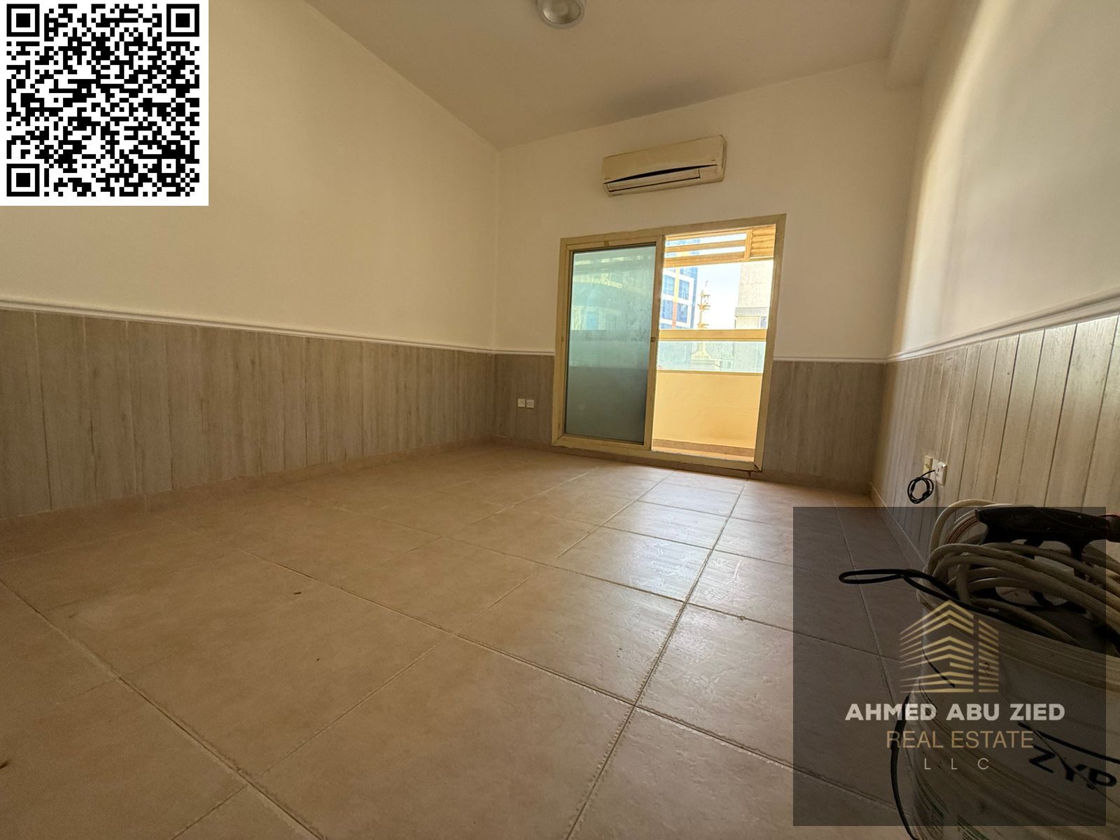 Largest 1-bedroom apartment for annual rent in Al Rawda 2, Ajman – master bedroom, balcony, built-in wardrobes, split A/C, with or without parking.