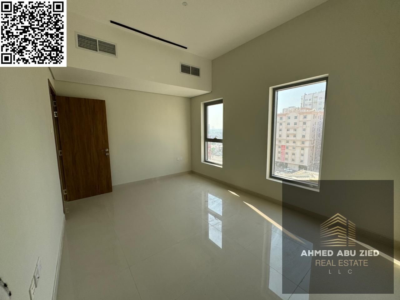 Luxury 2BR apartment for annual rent in Al Nuaimiya 1 Ajman near Al Hikmah School, brand new first tenant, central A/C, balcony, spacious kitchen, an