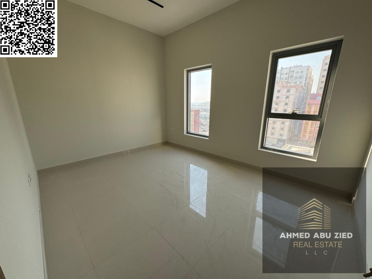 Luxury 3-bedroom apartment for annual rent in Al Nuaimiya 1, Ajman, near Al Hikmah School, brand-new building, first tenant, modern design, and prime