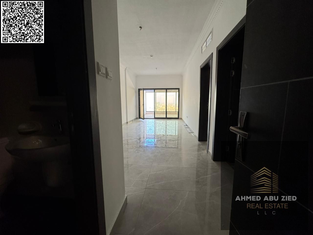 A premium 1BR apartment in Al Rashidiya 1, Ajman: free parking, 1 free month, free gym, pool & aqua park, built-in wardrobes, central AC.