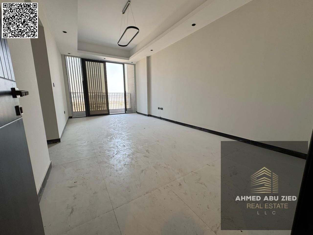 Annual rent: first-tenant 2BR in Al Jurf 3, both rooms master, central AC, balcony, hotel-style finish, spacious layout, prime location near Dubai exi