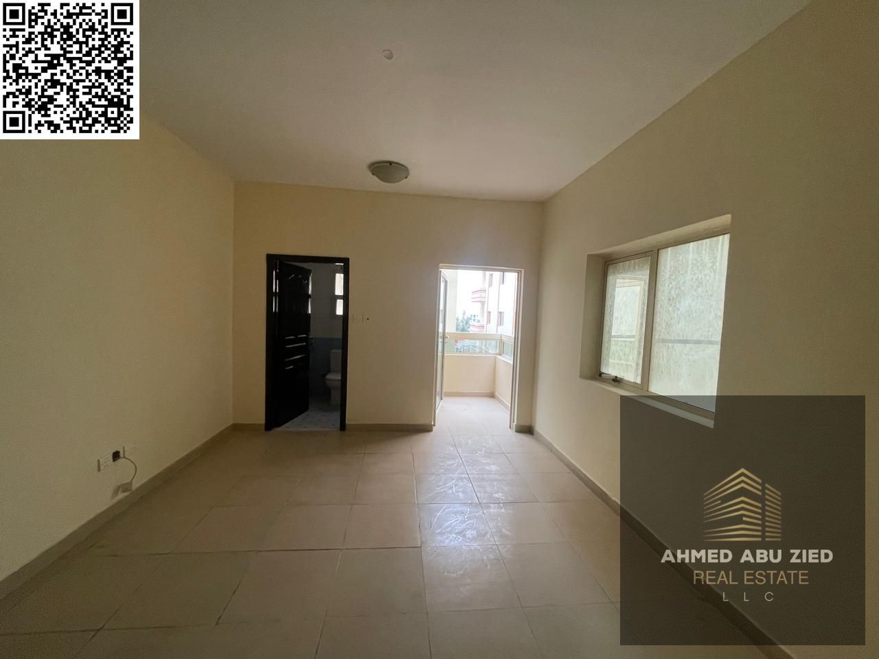 Elegant 3-bedroom apartment for annual rent in King Faisal Street, Ajman, modern design, master room with balcony, spacious layout, and prime locatio