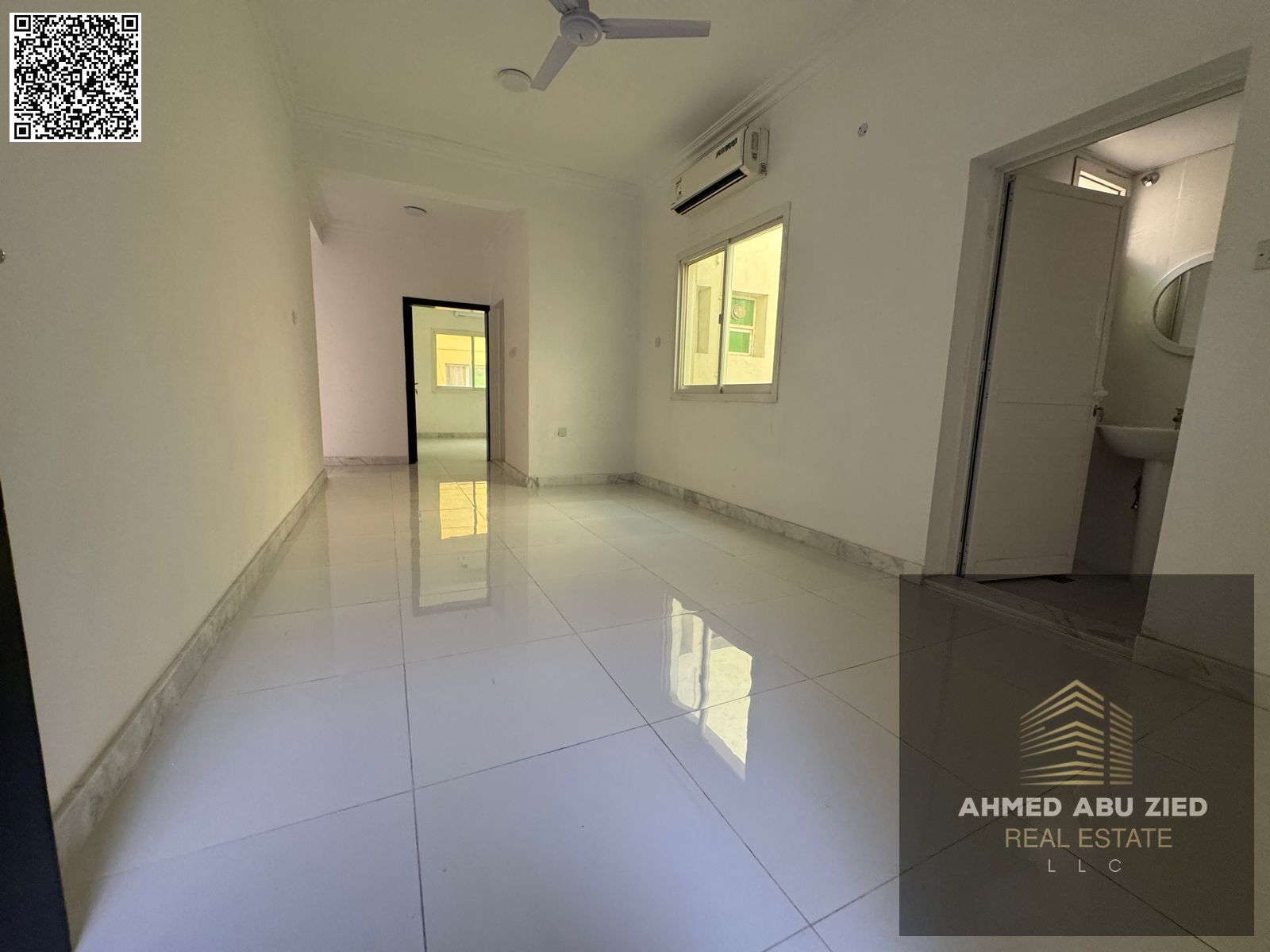 **In Ajman’s prime area (Al Rawda 2), the cheapest 2BR hall for annual rent — quality finish, spacious layout, flexible payments, 2 baths, split AC, b