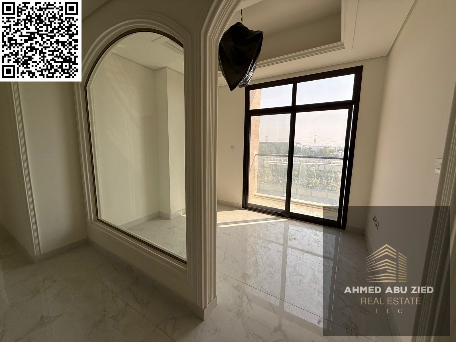 Brand-new 3-bedroom apartment for annual rent in Al Tallah 2, Ajman, with hall, majlis, balcony, central AC, pool, jacuzzi, and one free month.