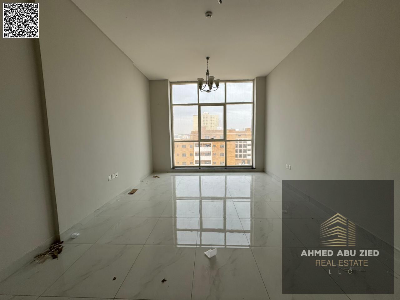 Annual rent 2BR apartment with living room in Al Jurf 3, free parking, easy payments, quality finish, sunny view, spacious, easy access to Dubai & Sha