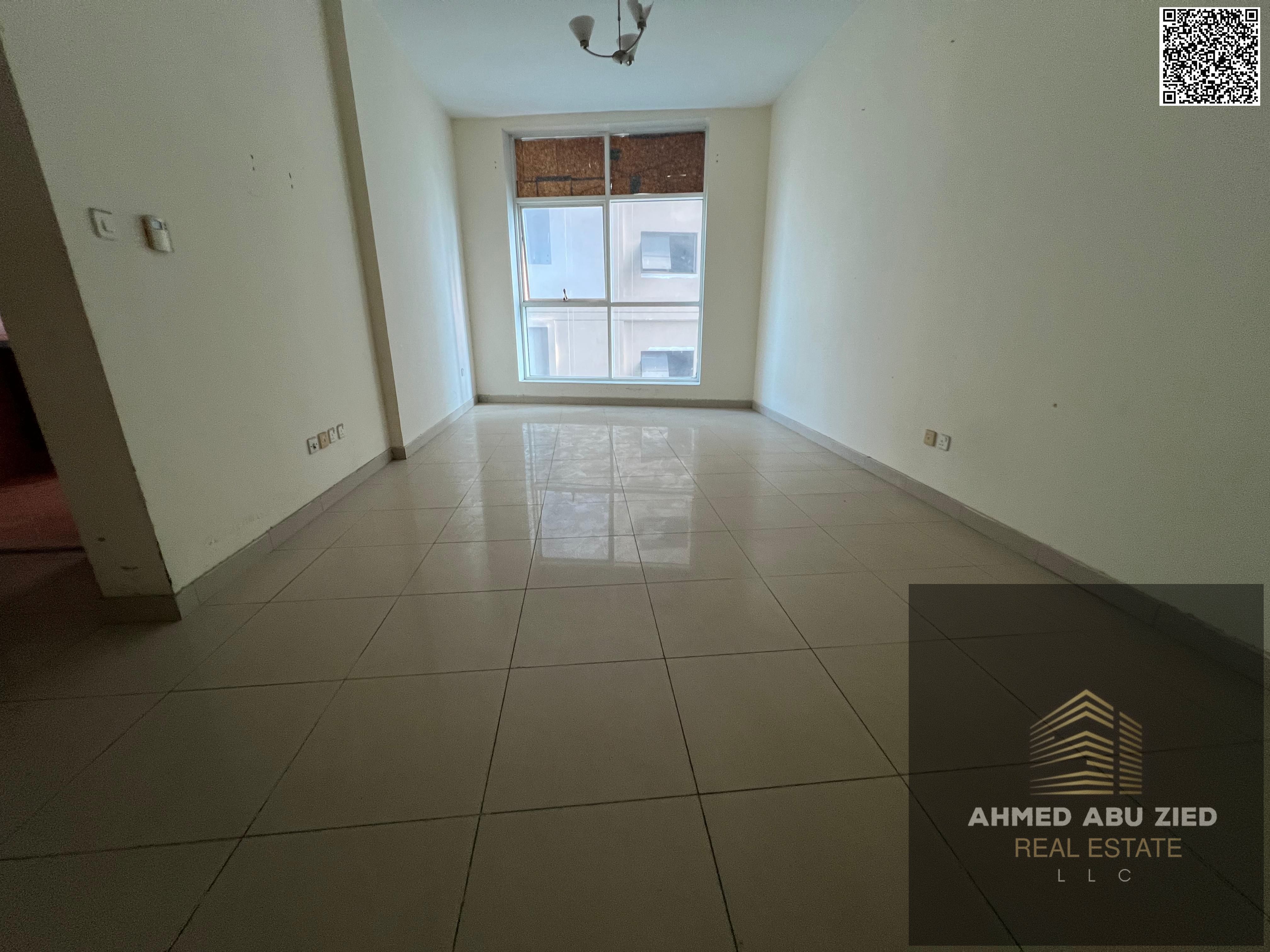 1BR Al Bustan, free AC, private parking, 2 baths, balcony, central AC, wardrobes, near Corniche, flexible payment.
