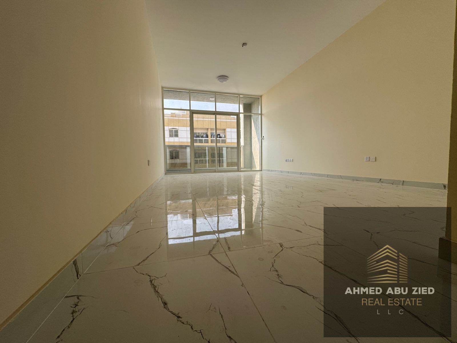 2BR+hall in Al Jurf 3, first tenant, maid’s room, 3 baths, wardrobes, central AC, balcony, hotel finish, spacious, prime location.