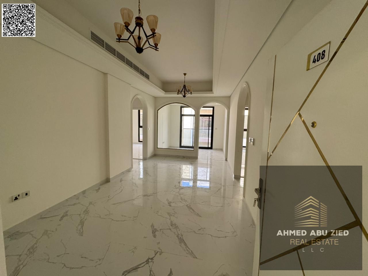 1 month free + free parking! Beautiful 2BR hall apartment in Al Tallah, central AC, balcony, built-in wardrobes, easy Dubai exit, flexible payments.