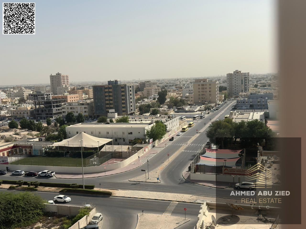 Annual rent: 2BR in Al Nuaimiya 3 with central AC, balcony, hotel-style finish, spacious layout, 2 baths, prime location, easy payments.
