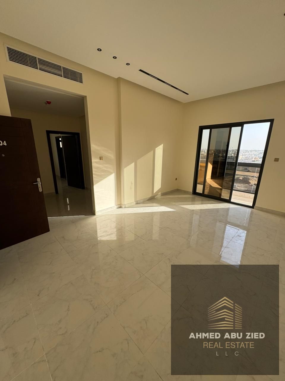 Brand-new 2BR + hall in Al Jurf, new building with premium finish & spacious layout. 1 month free, 2 master rooms, balcony, central AC, easy Dubai exi