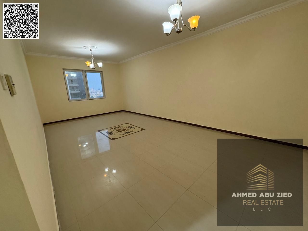2BR apartment with living room for annual rent in Al Nuaimiya, prime location, easy Sharjah exit, spacious, open view, central AC, flexible payment.