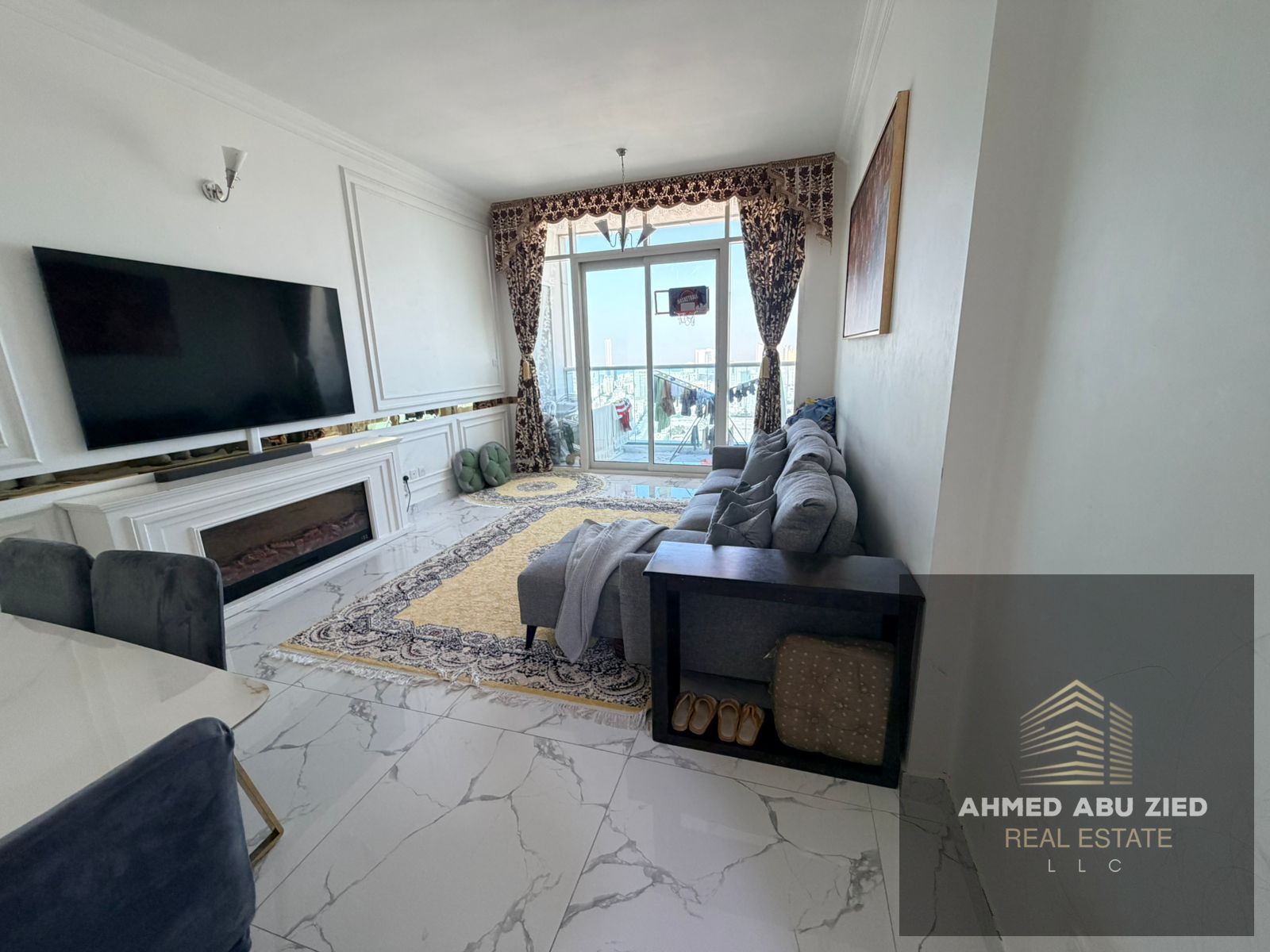 Luxury two-bedroom apartment with a spacious living room and a balcony with an open view | Suitable for living and investment