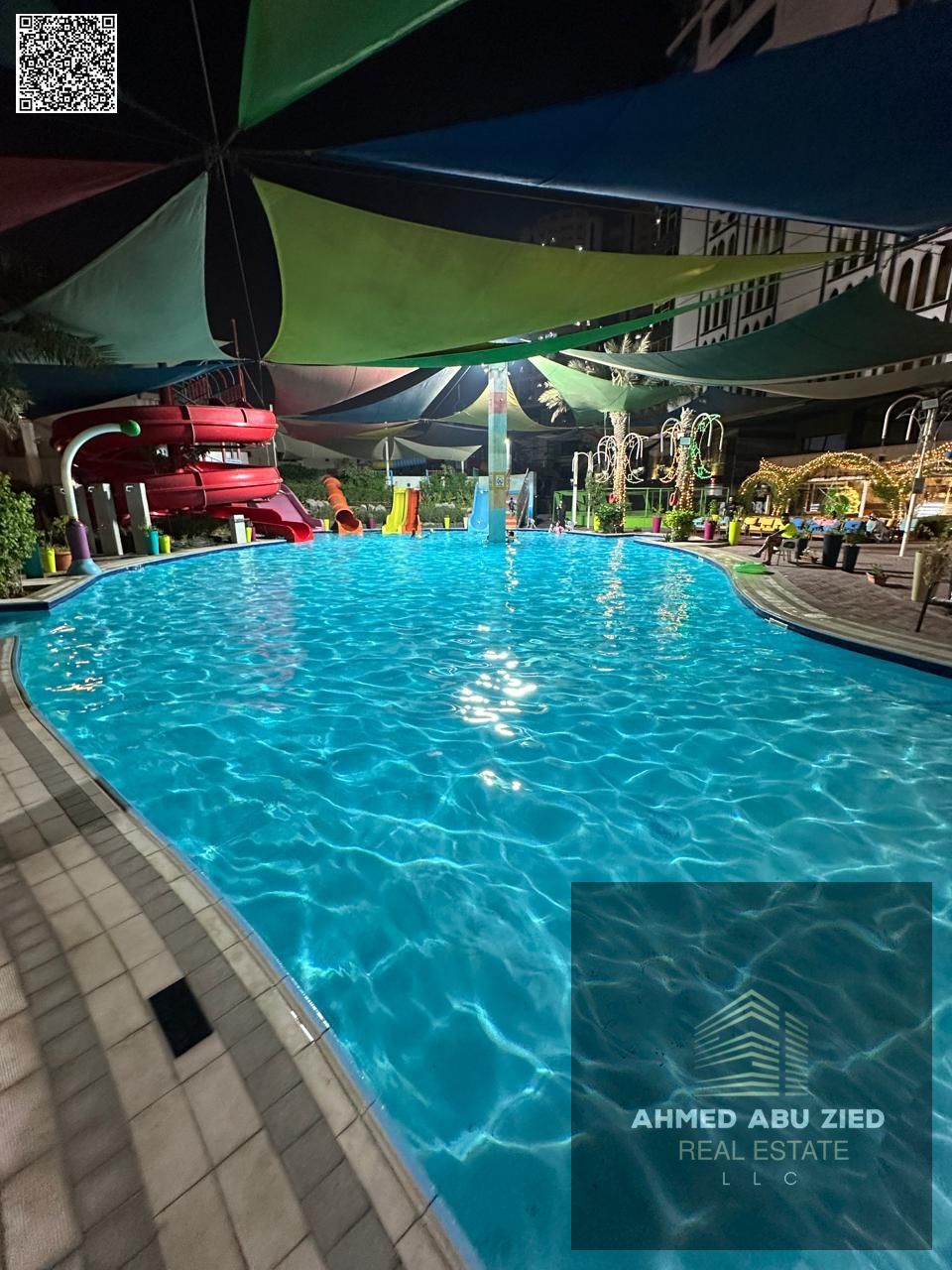 Beautiful 1BR apartment for annual rent in Ajman, Al Rashidiya 1, gym, pool & water park, balcony, free kitchen appliances, luxury finish.