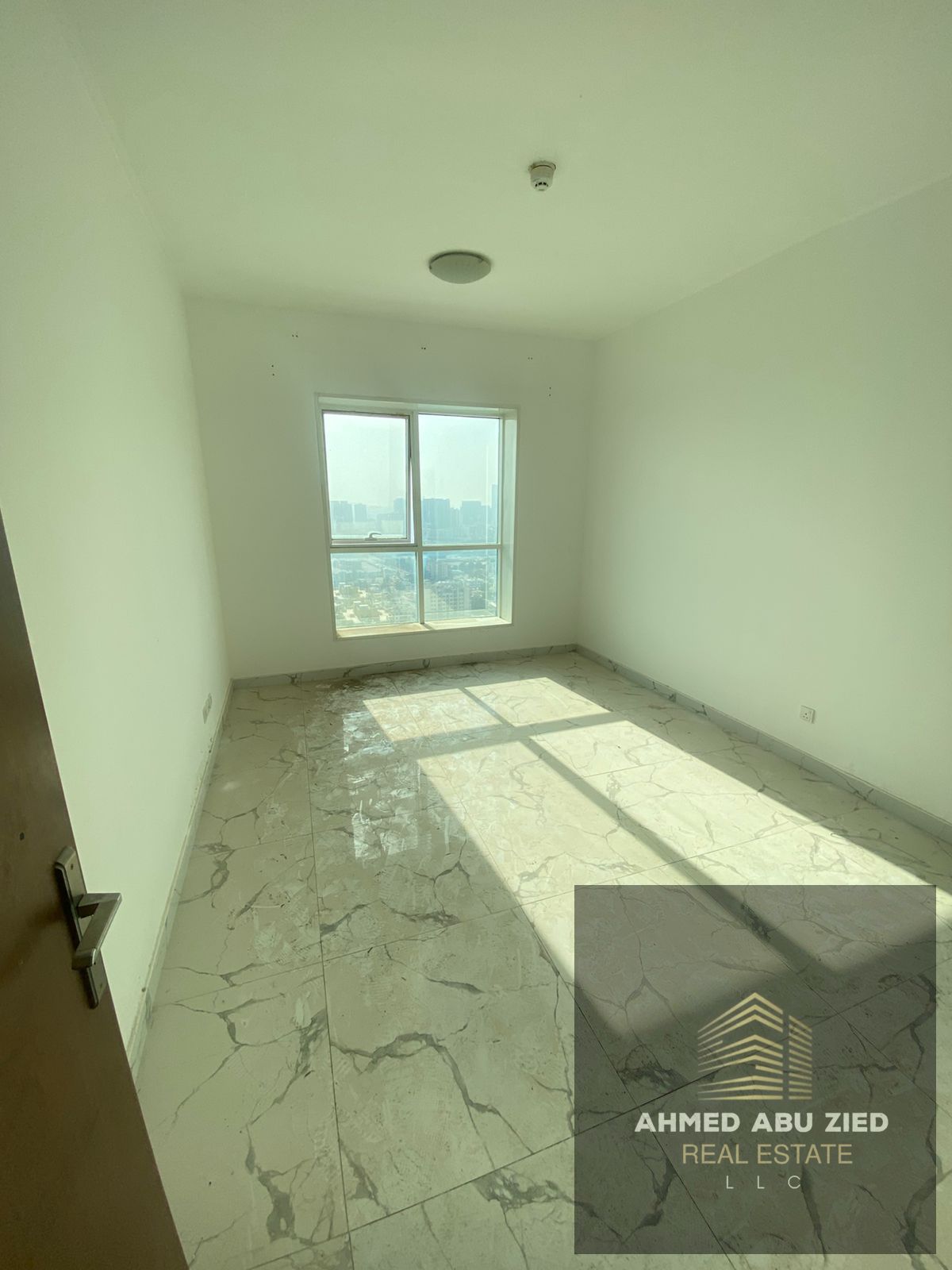 Luxury one-bedroom apartment for sale in the heart of Ajman | High floor with open views