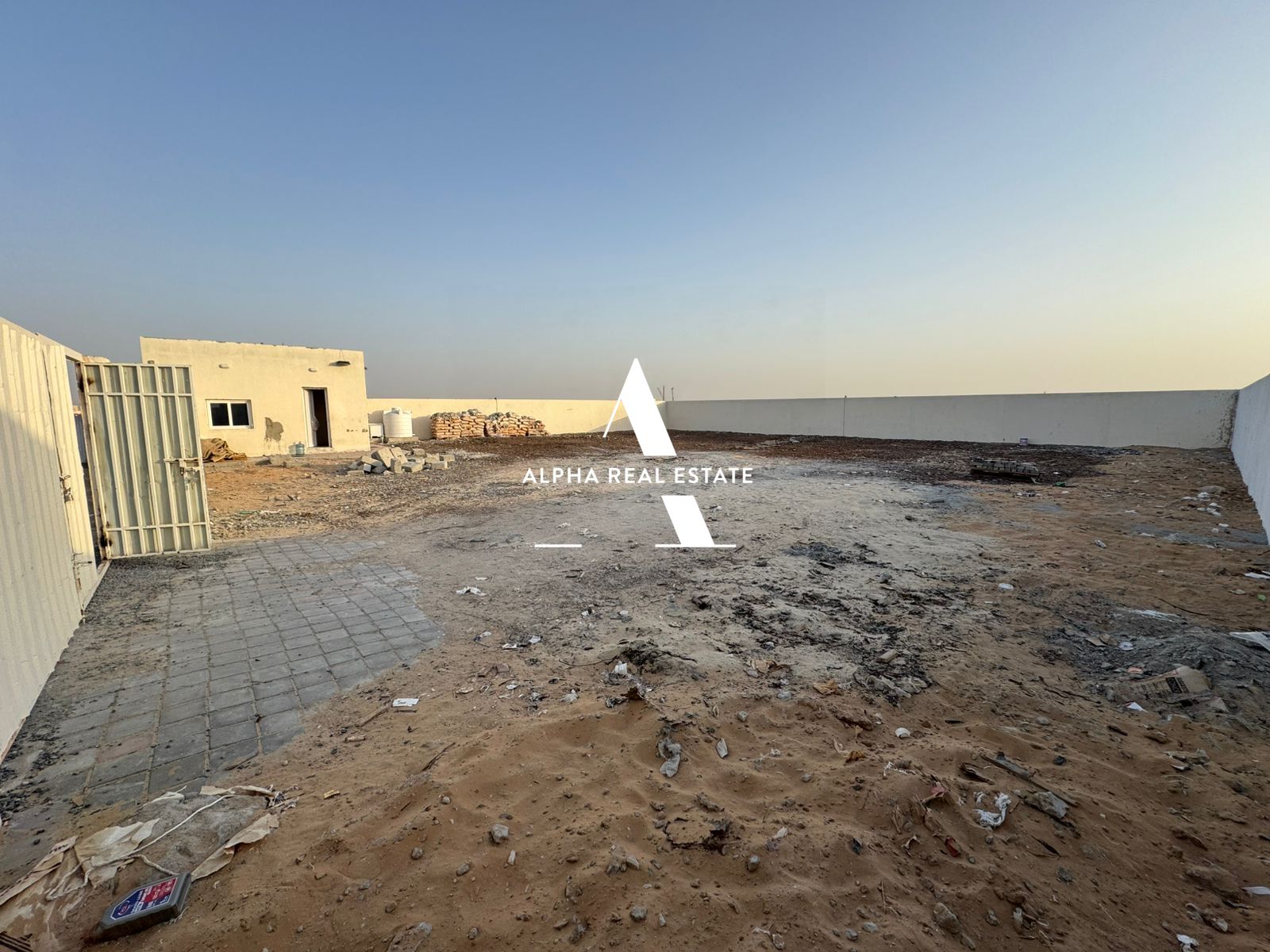 10,000 Sq. Ft. Open Industrial | No Electricity | Ideal for Storage | AED 75,000