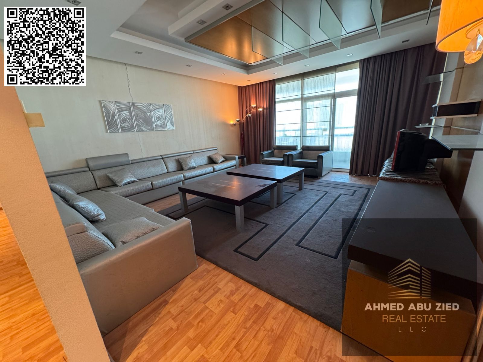 For annual rent in Ajman, a furnished one-bedroom apartment with a living room, two bathrooms, a balcony with an open view, a very spacious layout