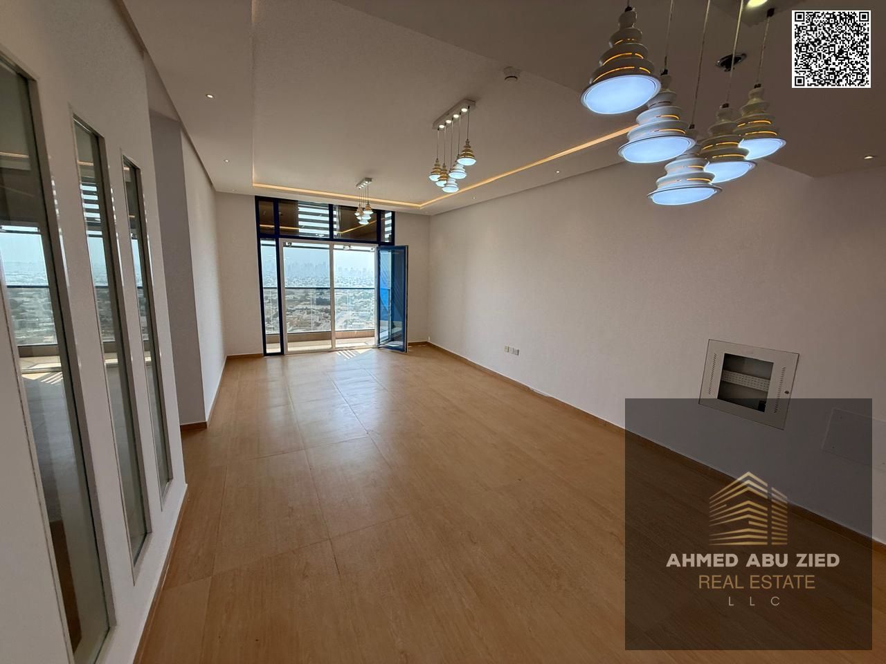 Annual rent 3BR + hall in Al Nuaimiya 3 – prime location near Sharjah exit, new tower, free parking, central AC, balcony with great view, easy payment