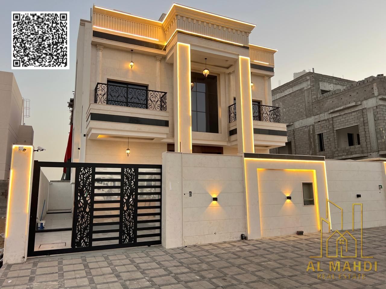 Direct from the owner, including all ownership fees: A villa in one of Ajman's most luxurious villas, built and finished to a super deluxe standard, w