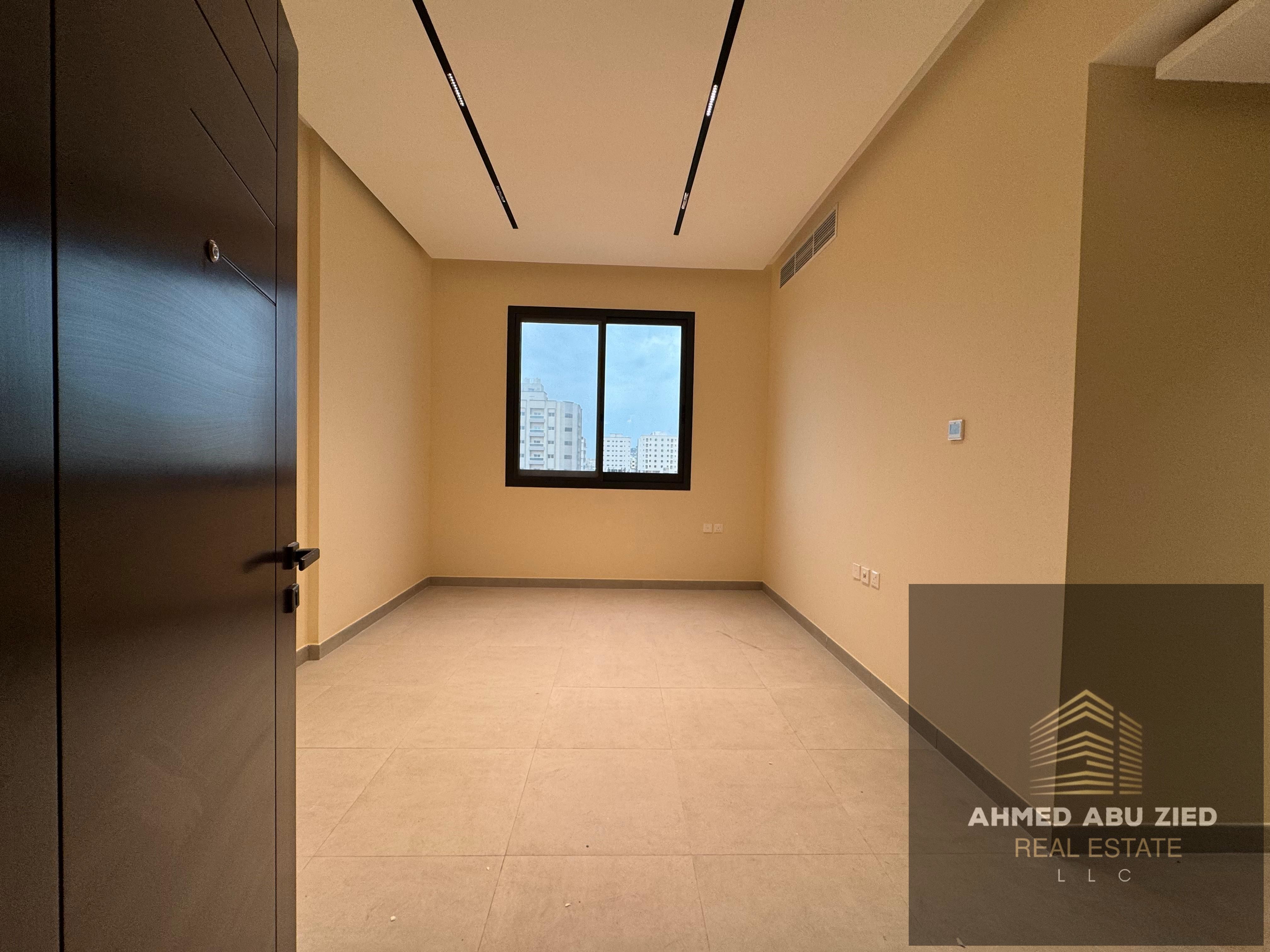 Spacious 2 Bedroom Hall with Built-in Wardrobes – One Month Free in Al Jurf 3 A large apartment featuring two bedrooms with built-in wardrobes, JARFF