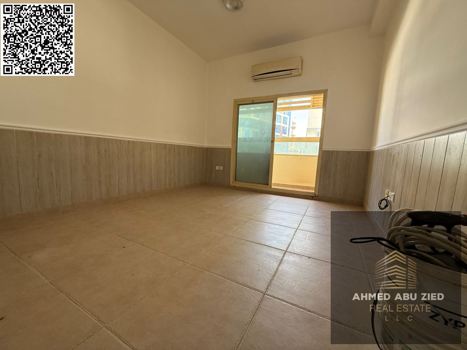 For annual rent in Ajman, a one-bedroom apartment with a living room, bathroom, and balcony is available. It boasts a spacious layout, split air condi