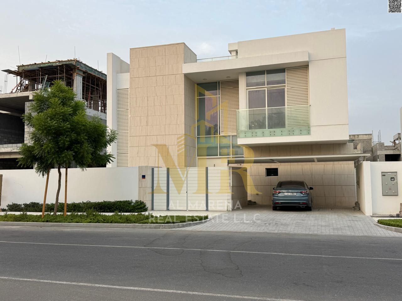 Luxury two-story villa with a rooftop terrace for sale in Al-Zawraa. Spacious area, private pool, and internal elevator. Includes fees, electricity, w
