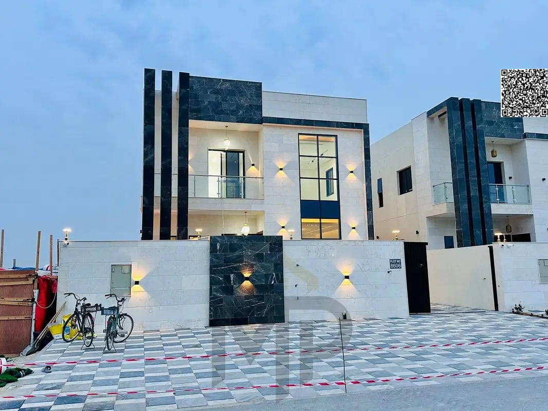 A villa among the most luxurious villas in Ajman, built and finished to a super deluxe standard, with a very large building area and rooms, freehold o