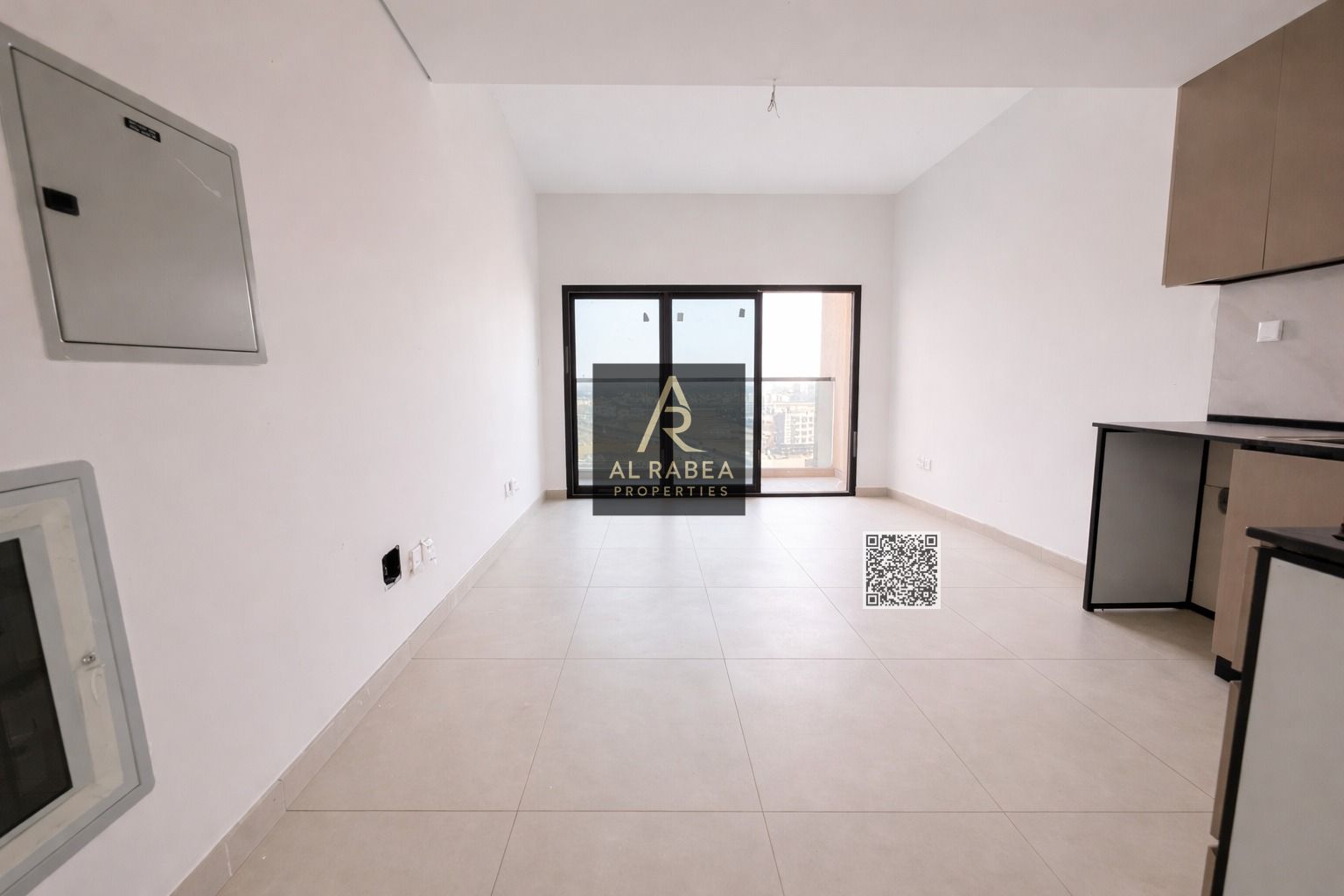 A unique opportunity for annual rent in Ajman: a studio apartment with a balcony, gym, swimming pool, parking, garden, and central air conditioning.
