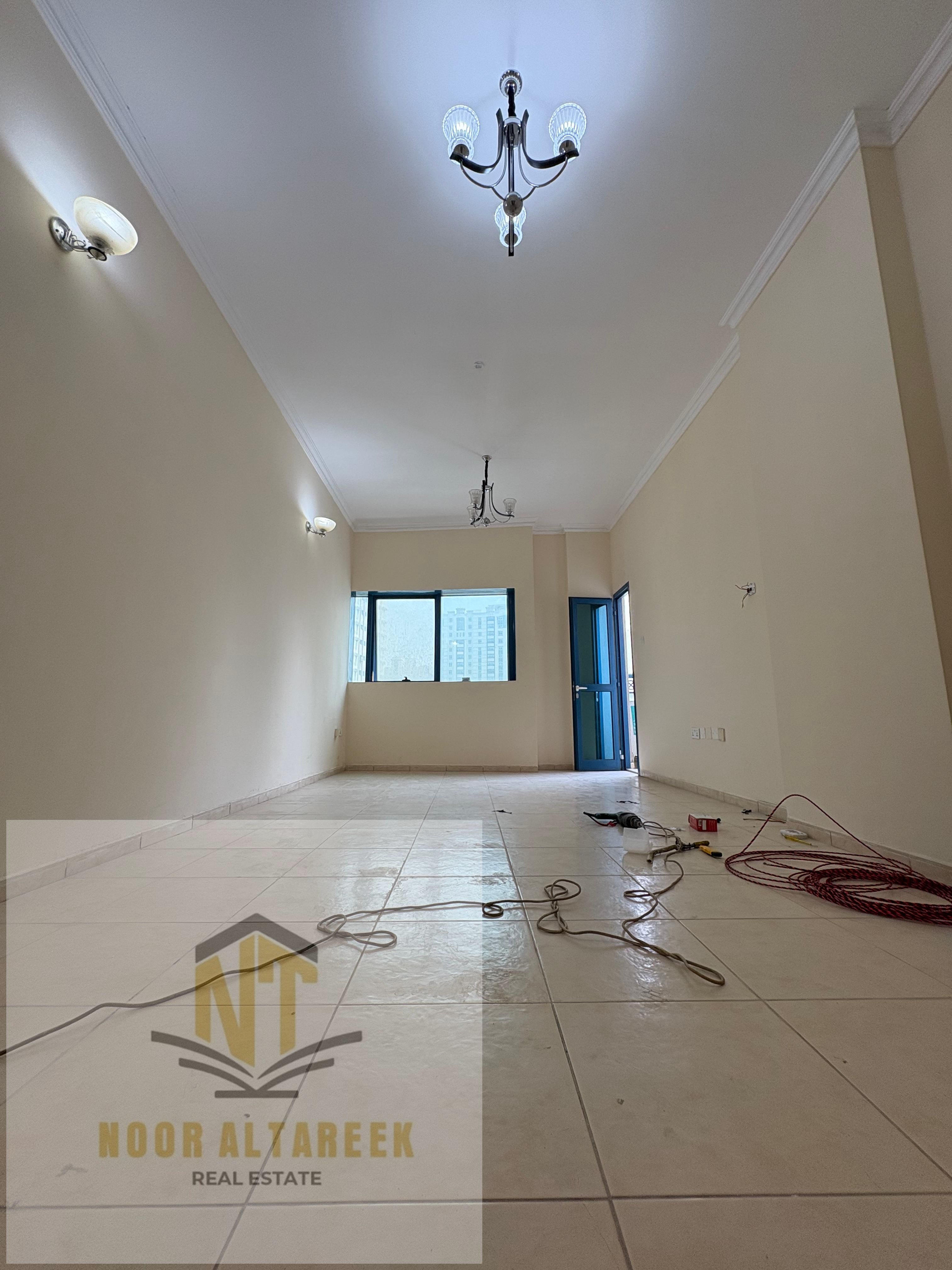 The rolla has two rooms, a living room, two bathrooms, a balcony, and a free month