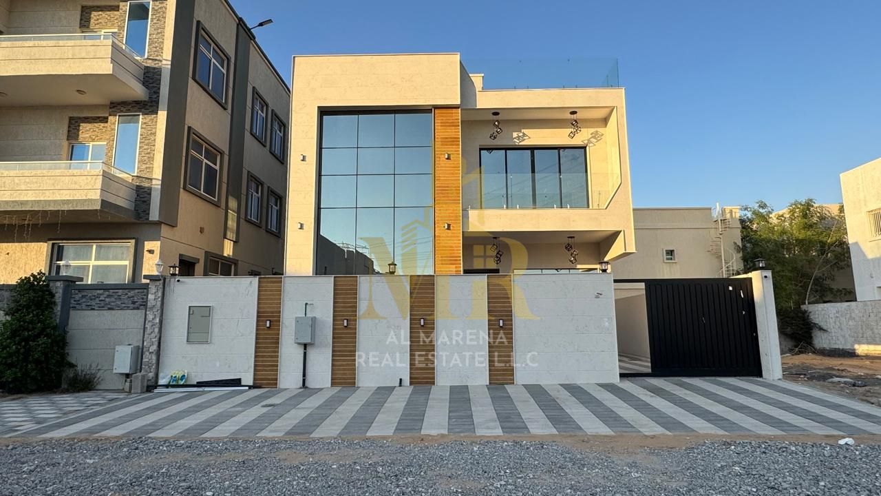 Luxury Villa in Al Hiliu 2 | Two Floors + Roof | 5 Master Bedrooms | Premium Yard | Electricity, Water & Central AC Included