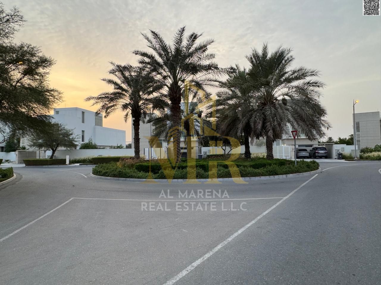 Luxury two-story villa with a rooftop terrace for sale in Al-Zawraa. Spacious area, private pool, and internal elevator. Includes fees, electricity, w