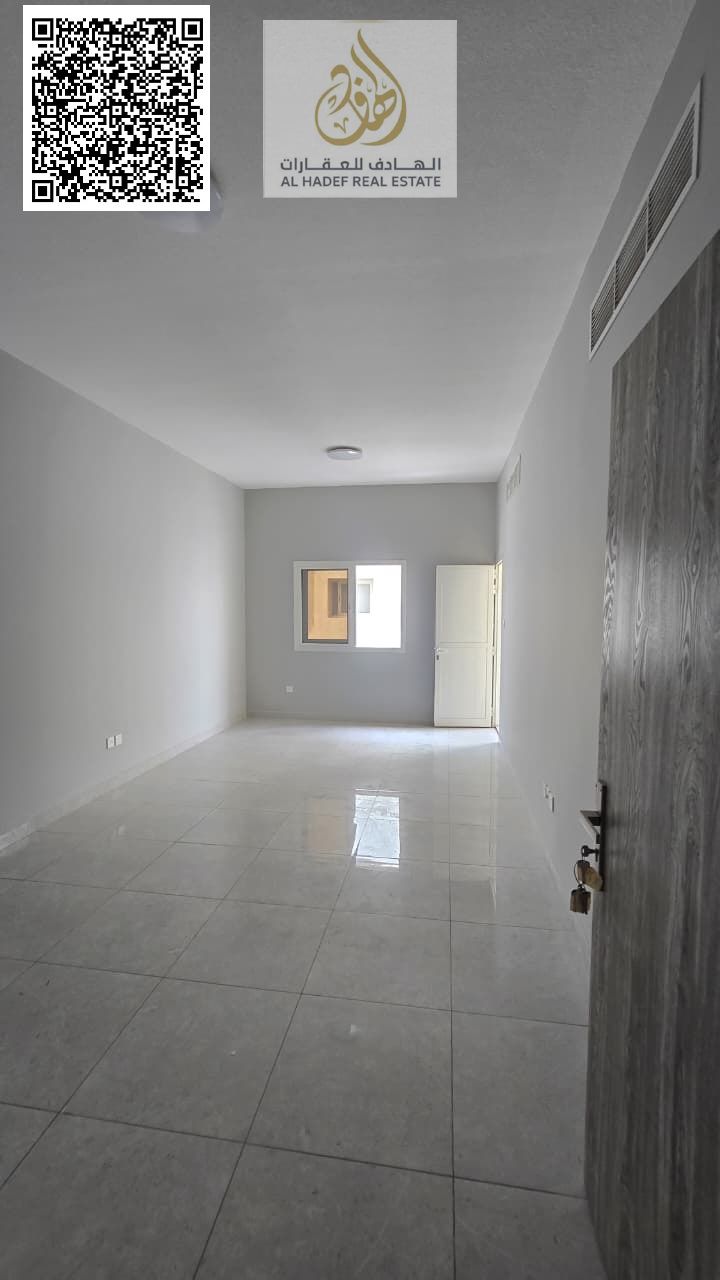One-bedroom apartment with a living room, two bathrooms, balcony, and built-in wardrobes. Second occupancy in Al-Jarf 3, on a main street. High-qualit