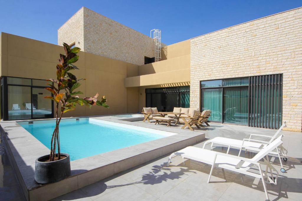 Luxury 4BR + maid's with private pool