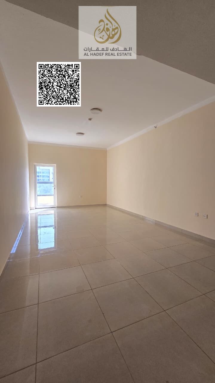 Three-bedroom apartment with a living room for annual rent in Al-Jarf 2 area