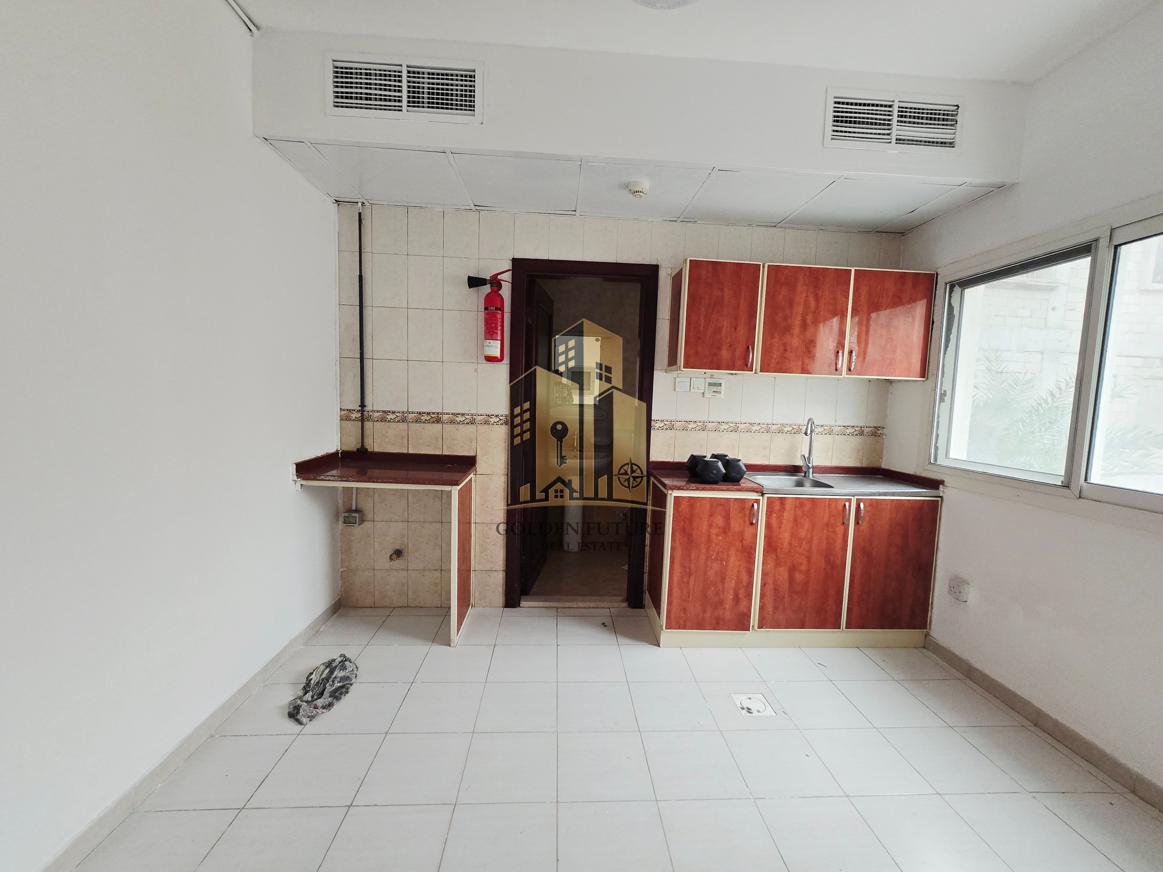 CLOSE TO MUWAILEH BUS STATION CENTRAL AC STUDIO READY TO MOVE MAINTENANCE FREE WELL DESIGN FREE SAND PARKING