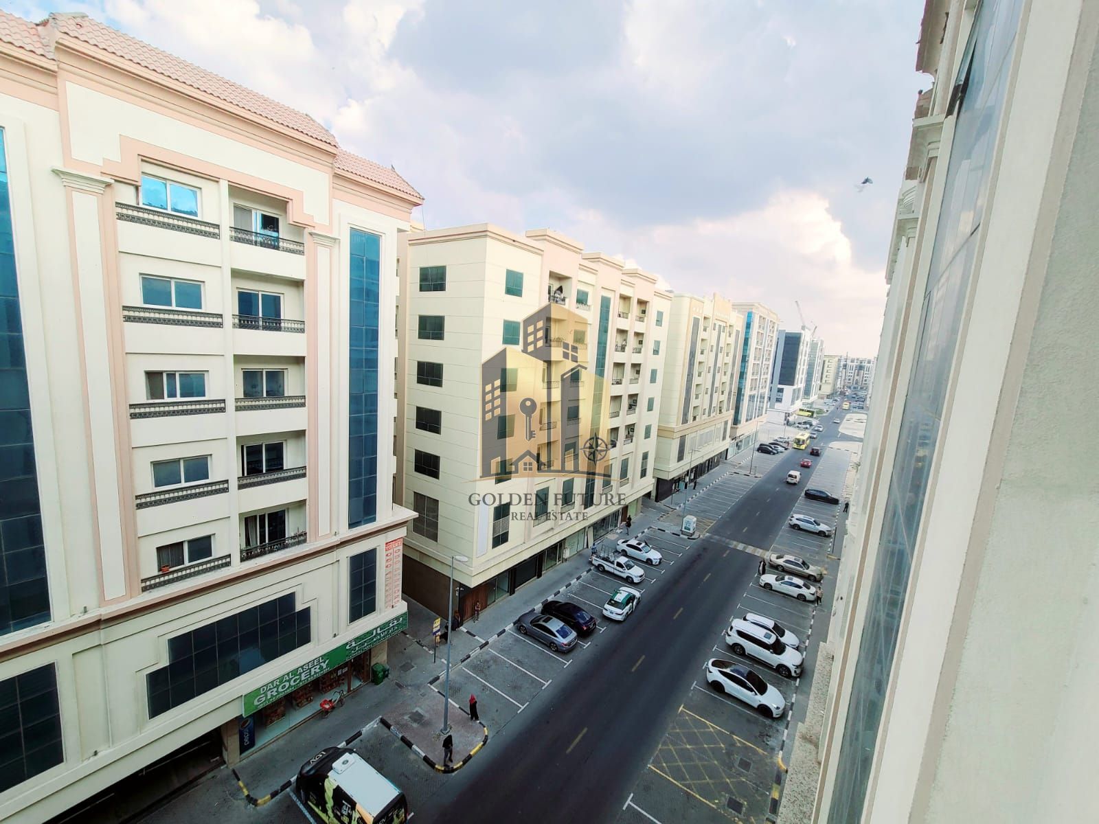 Lavish apartment with balcony cover parking 2 master room close to sharja airport road