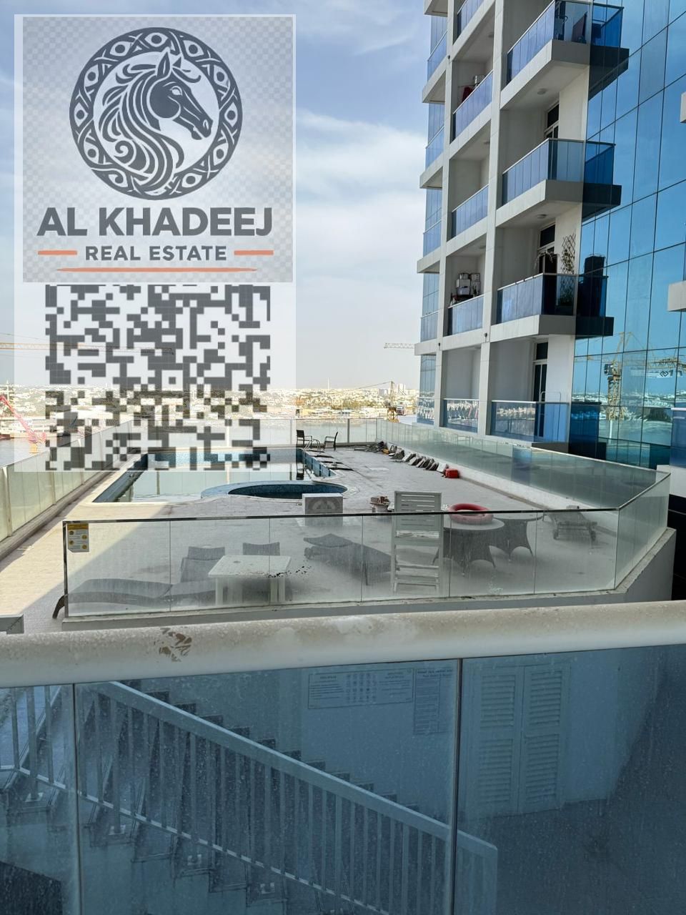 Two bedrooms and a spacious living room with an open view, gym, swimming pool, and free parking in Al Rashidiya Oasis Tower 1