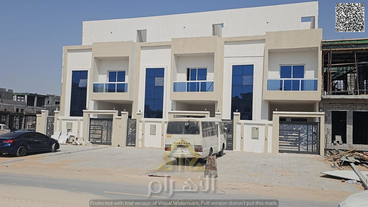 Luxury villa in Al Helio 2, Ajman, ready for immediate occupancy, featuring high-end finishes and spacious living areas. Price includes registration f