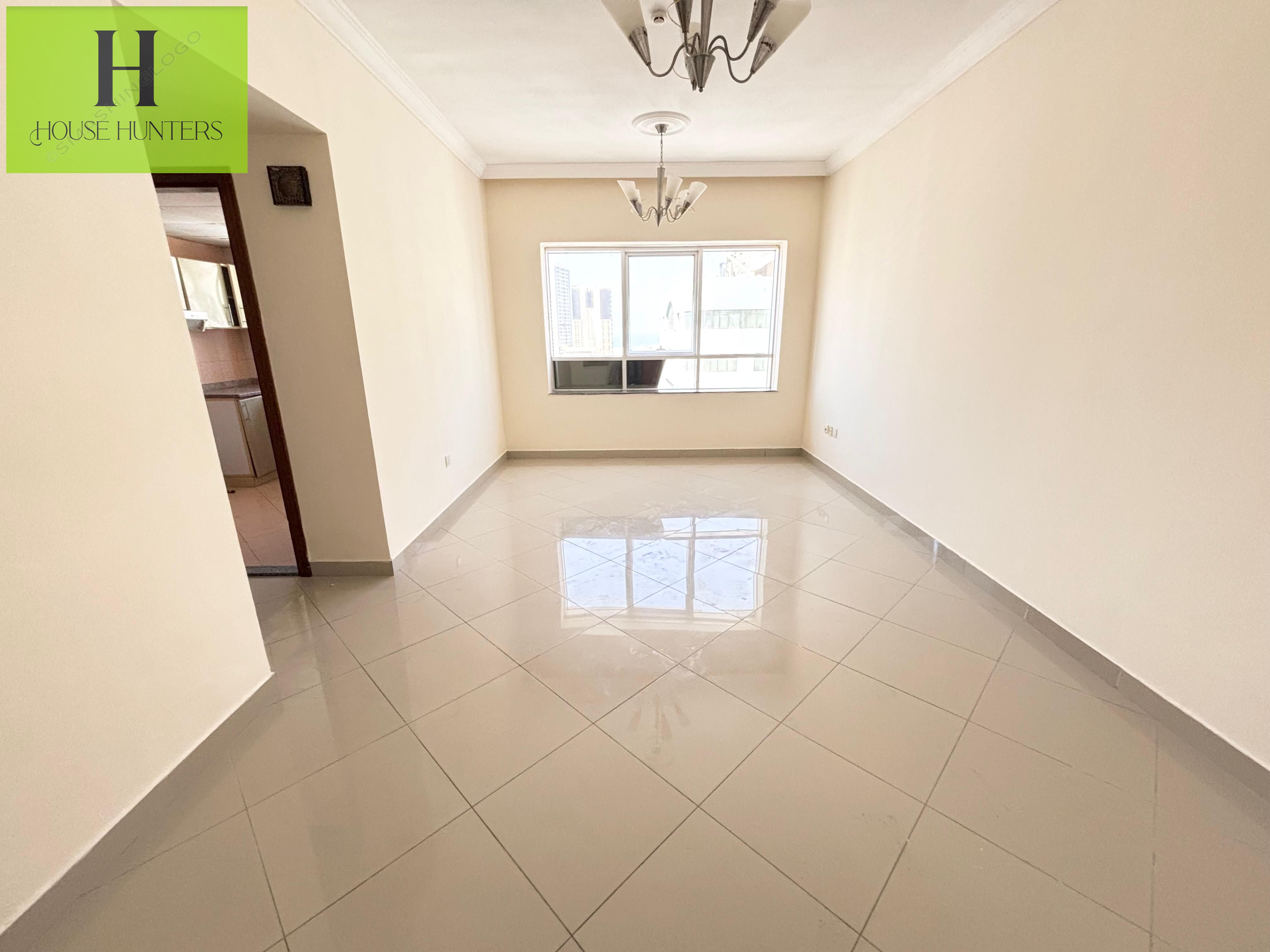 SPACIOUS 1BHK APARTMENT+GYM -SWIMMING POOL FREE -KIDS PLAYING AERA FREE EASY EXIT TO DUBAI