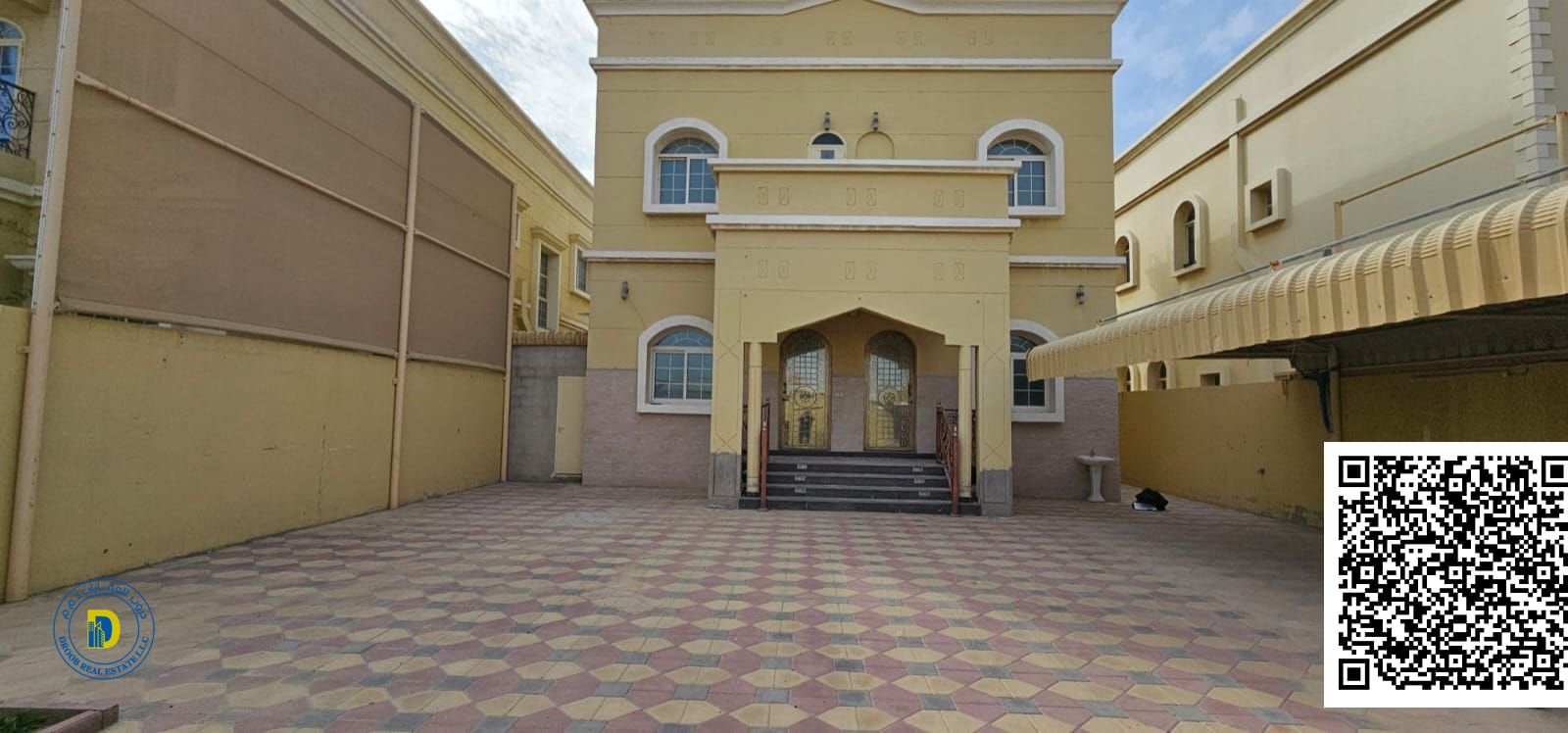 Strategically located in Al Muwaihat, a luxurious 5-bedroom villa on a main street.