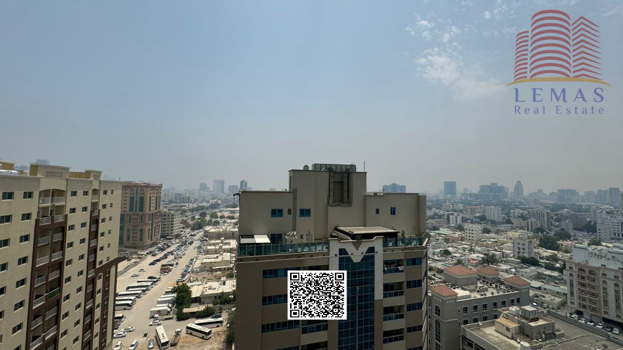 Two-bedroom apartment with a city view and spacious living area.