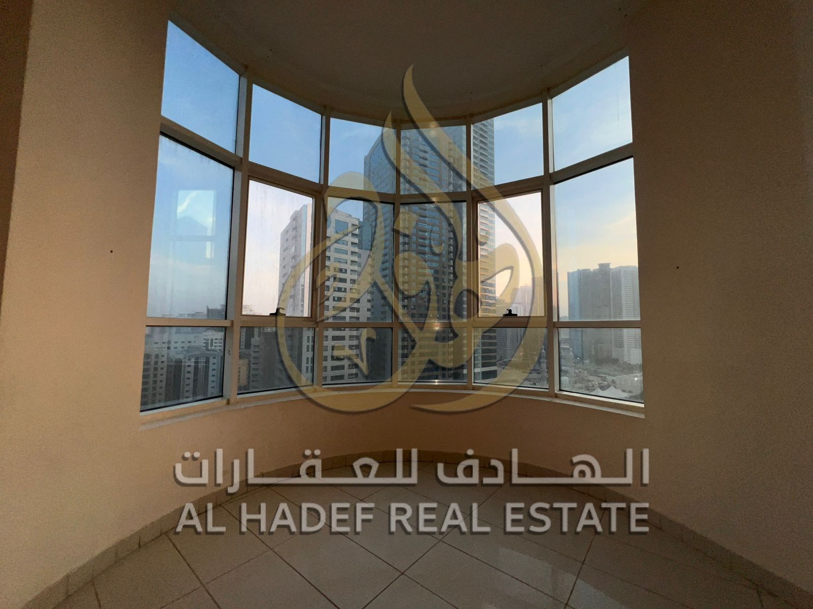 2BR apartment in Al Majaz 3, master bedrooms with hall, spacious living room, balcony, maid’s room, direct sea view & free premium services.