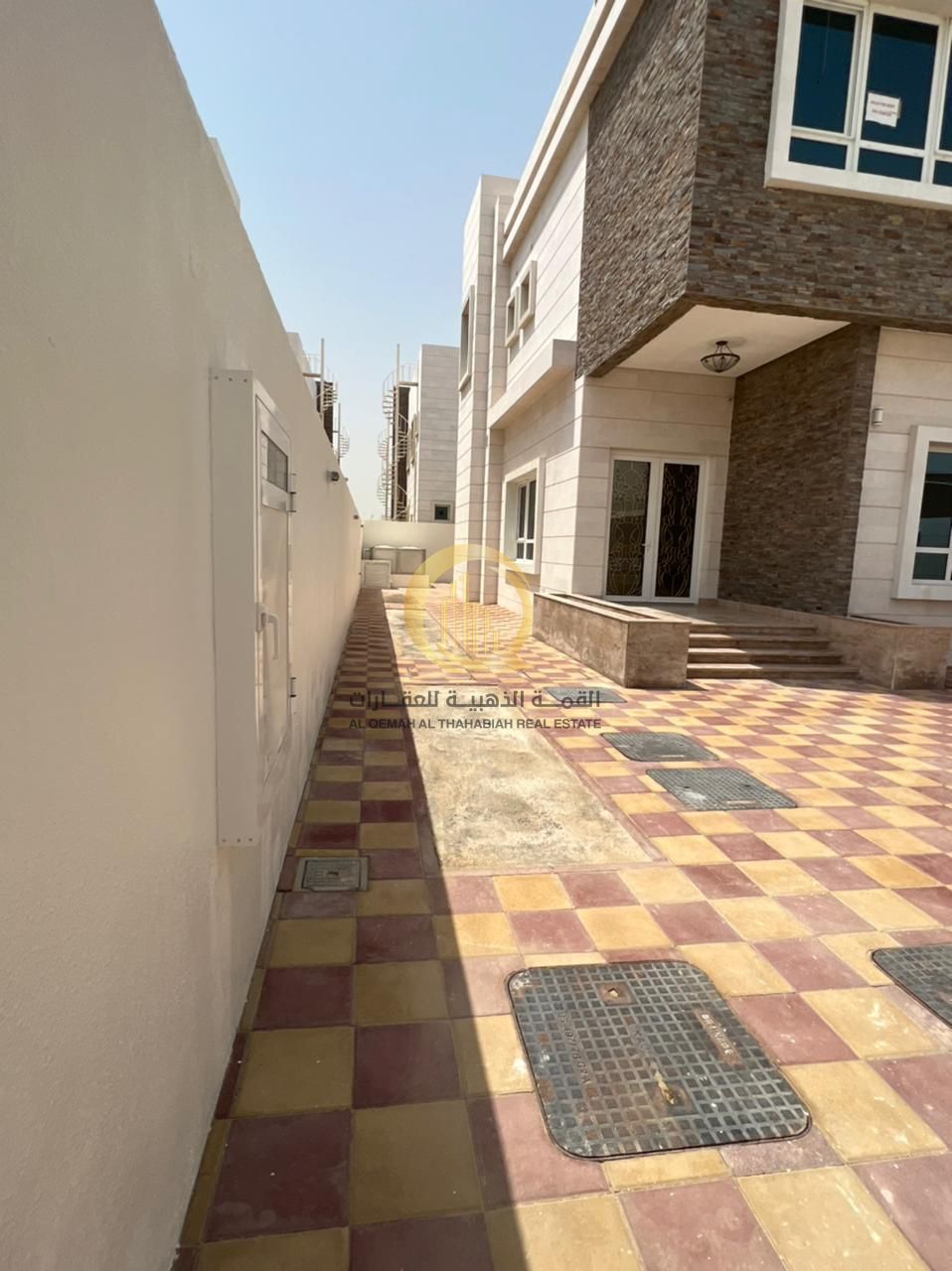 For sale: two adjacent villas in Al-Houshi with high-end, modern, and distinctive finishes. Freehold ownership for Arab buyers.