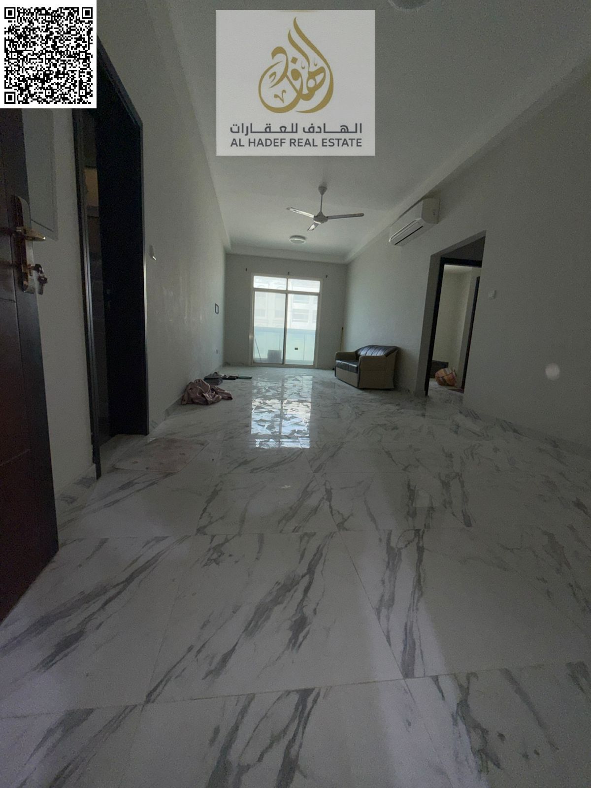 One-bedroom apartment with a living room, balcony, two bathrooms, and a kitchen. Very spacious. Family-only building in Al Rawda 3, Al Salam Street, n
