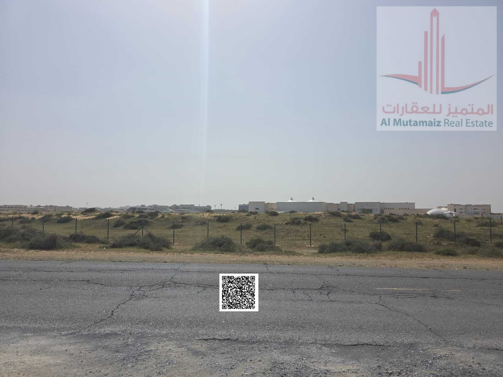 Commercial land for sale in installments in Al-Dabdaba North, prime locations near the main road, opposite Al-Yasmin.