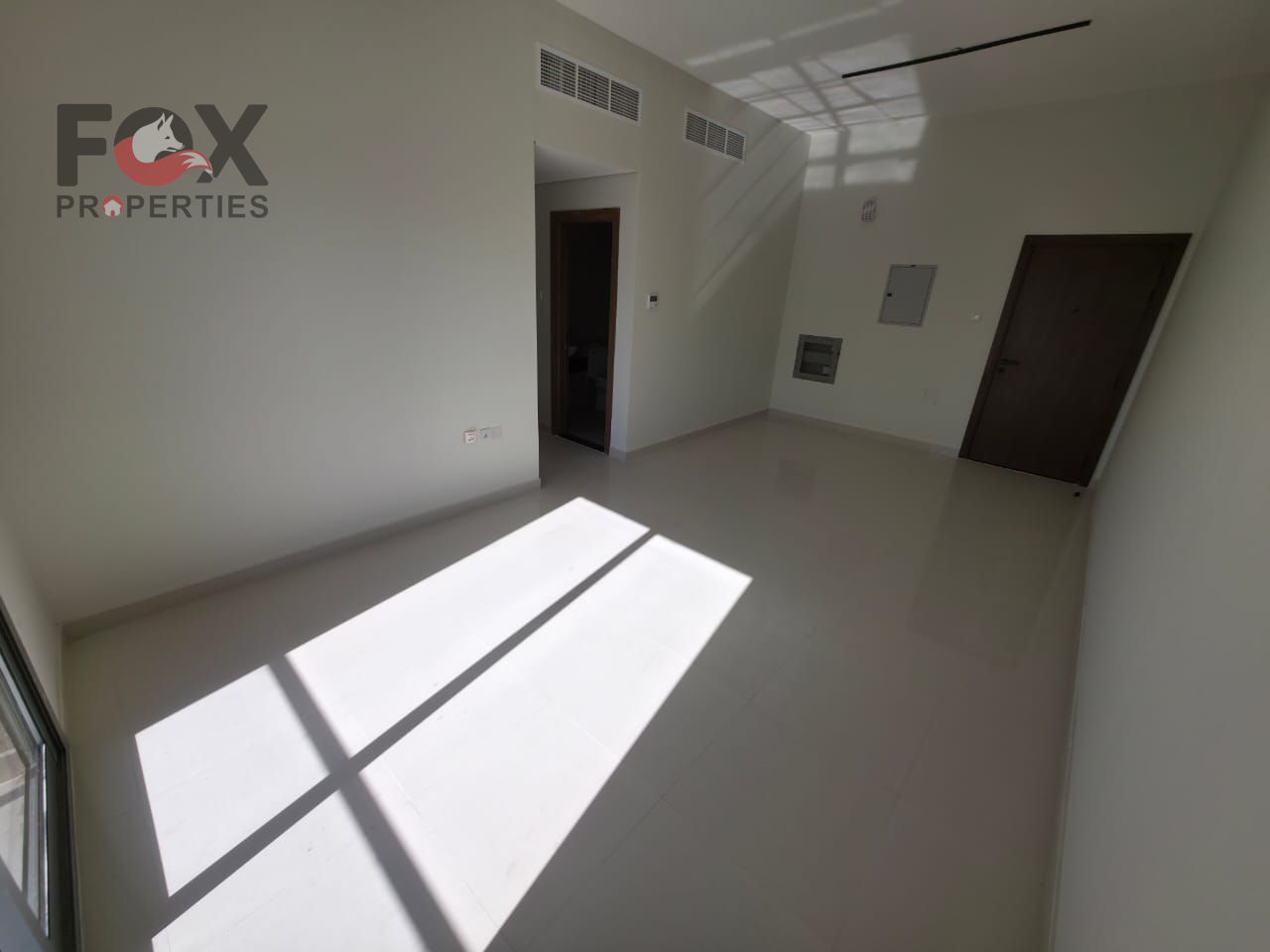 Two-bedroom apartment with a living room for annual rent in Al Nuaimiya 1 - Ajman, located next to Al Hikma School in a prime location with easy acces